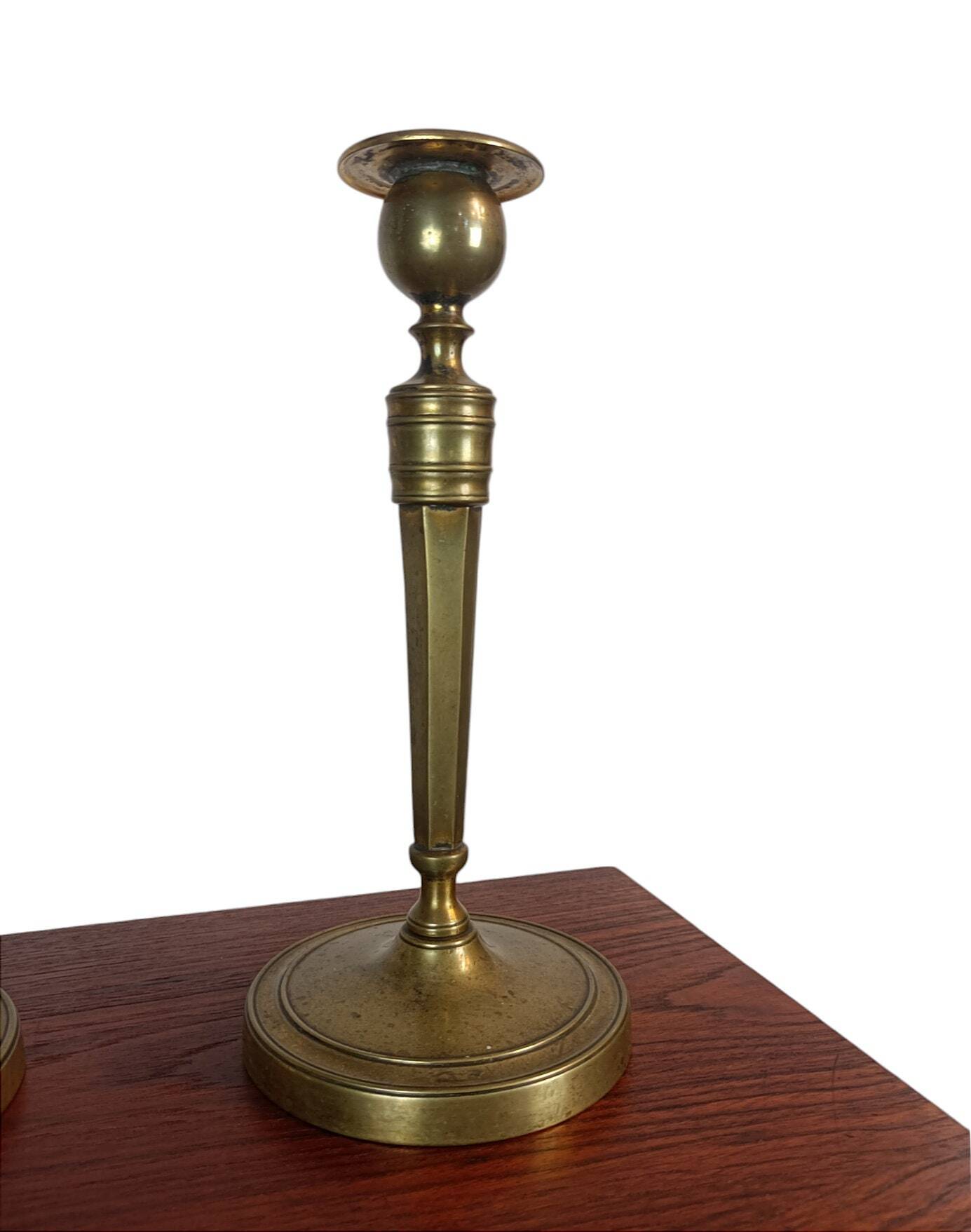 Pair of brass candlesticks, 19th century, neoclassical style.