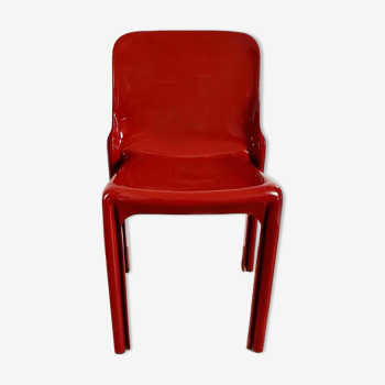 Red chair "selene" by vico magistretti for artemide of the 60s