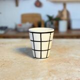Tisslit glass, handcrafted with a black and white checkered pattern.