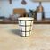 Tisslit glass, handcrafted with a black and white checkered pattern.