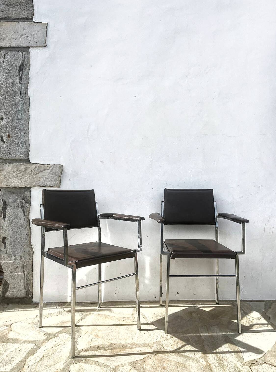 2 chrome designer chairs