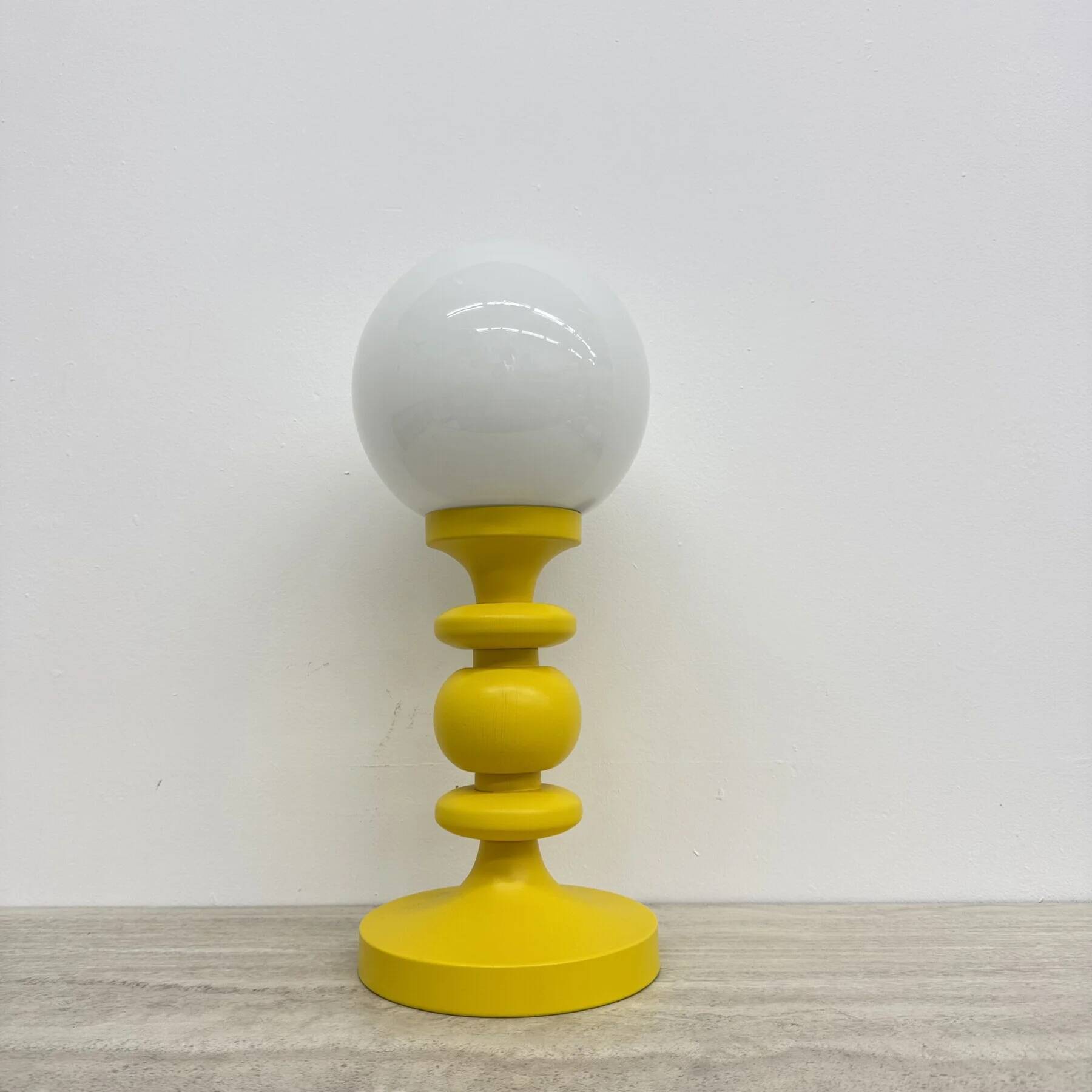 Mid-century design yellow table lamp with glass globe, 1970s