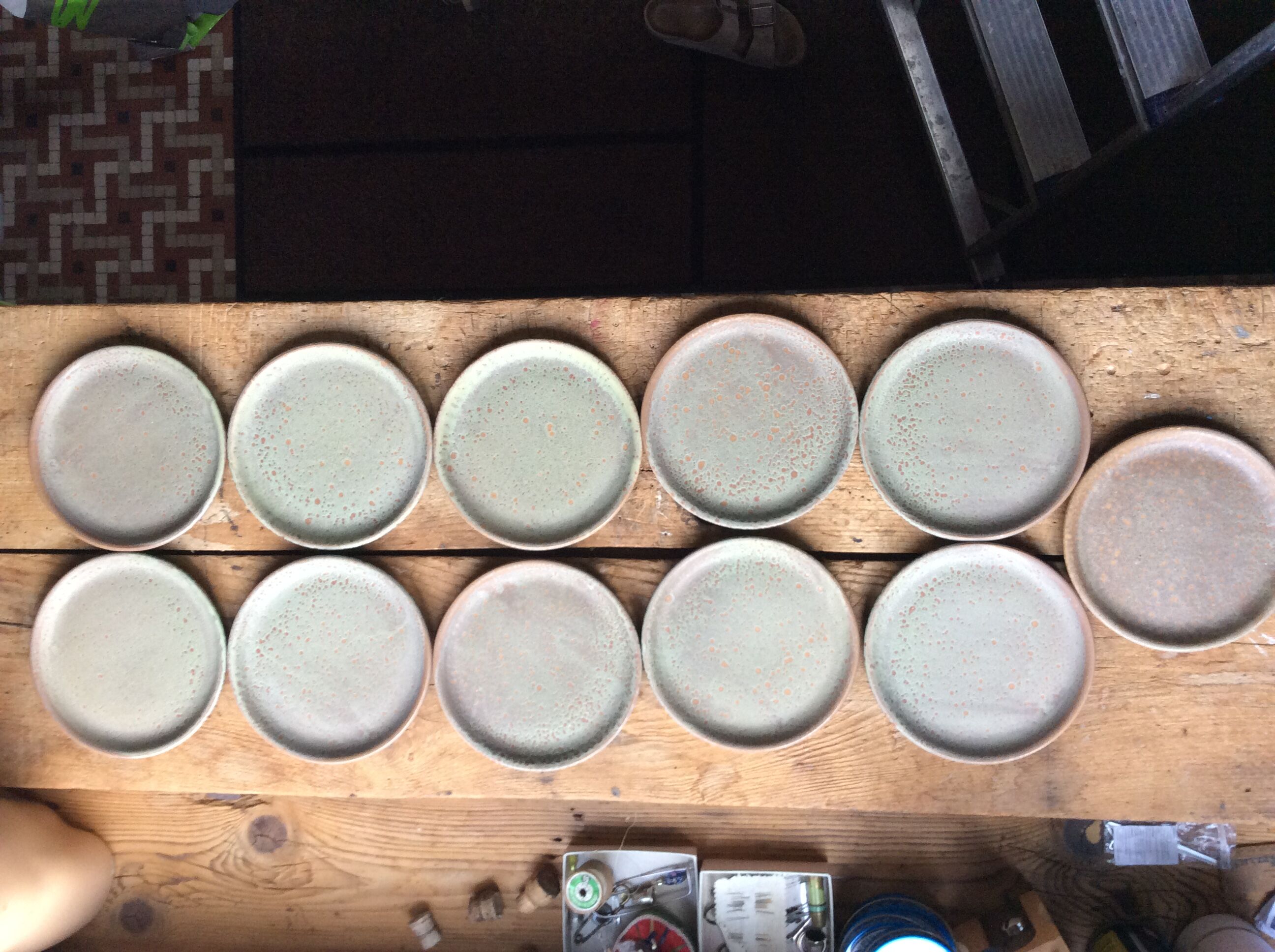 Set of 12 large and 11 small sandstone plates