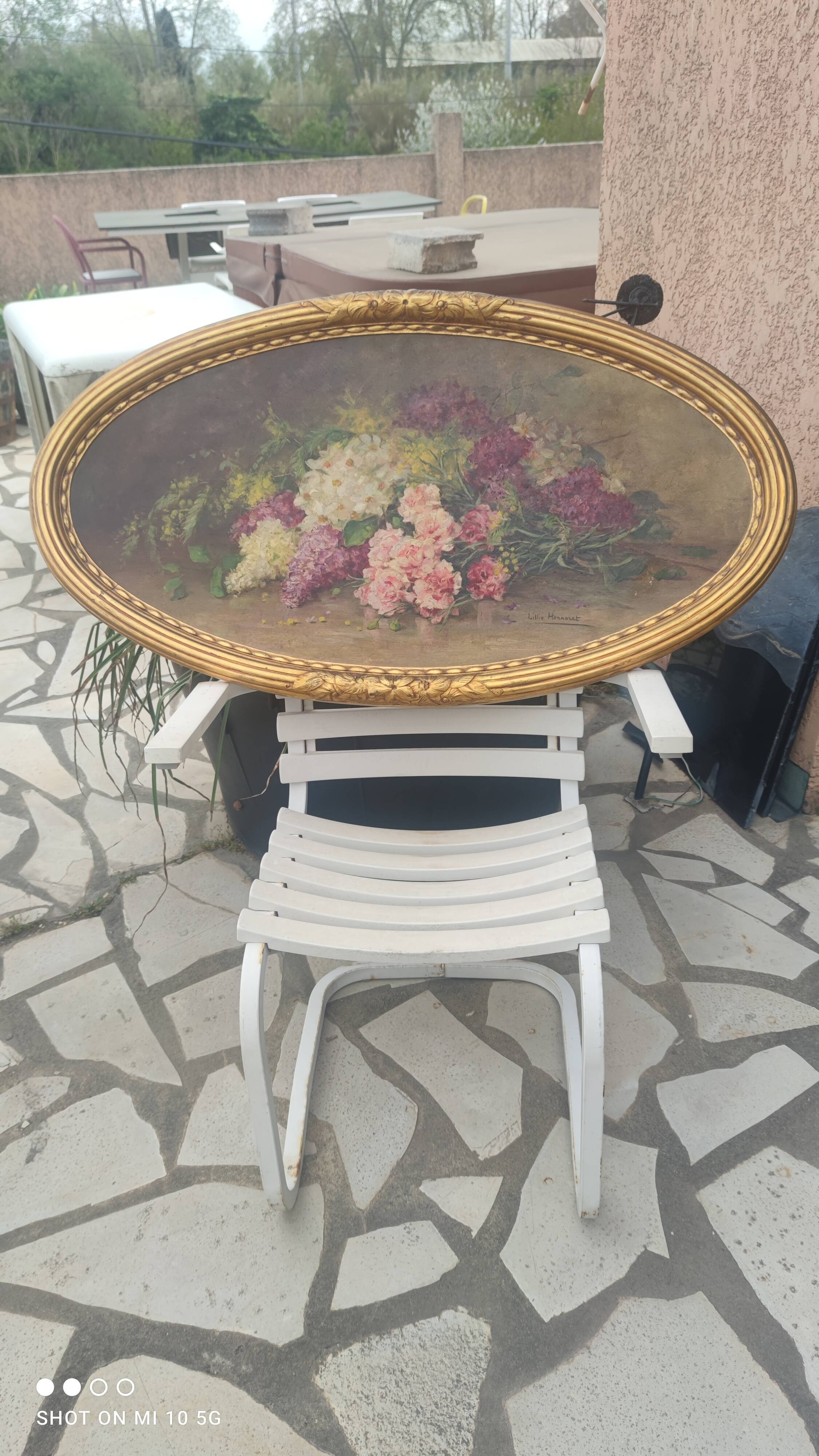 Elliptical table still life bouquet of flowers oil on wood by Lillie Honnorat