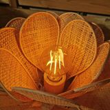 Flower table lamp made of rattan and raffia petals