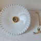 Serrated opaline suspension