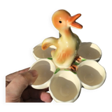 Egg cup with central chick decoration