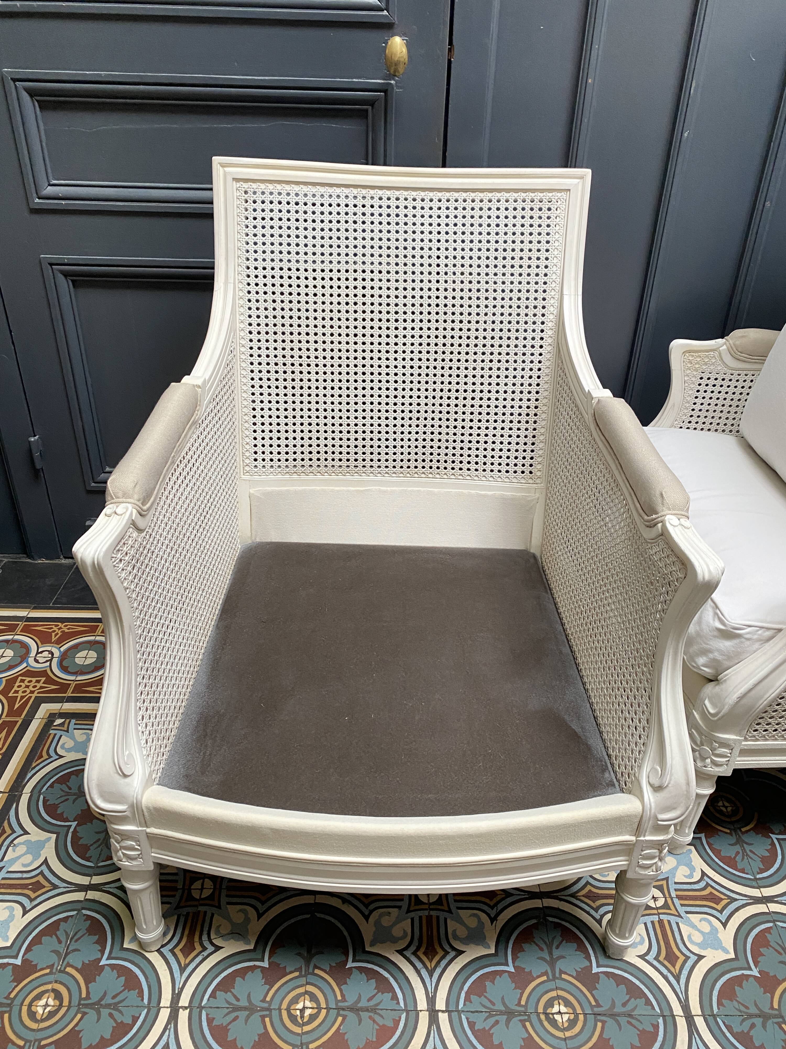 Pair of Louis XVI style caned Bergère armchairs