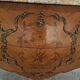 Commode style Louis XV en marqueterie et bois de rose
