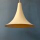 Small vintage beige pendant light in the shape of a witch's hat.