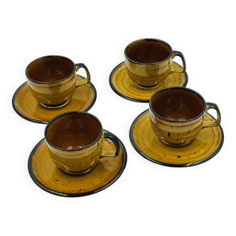 Set of four vintage Boch Palma cups and saucers.