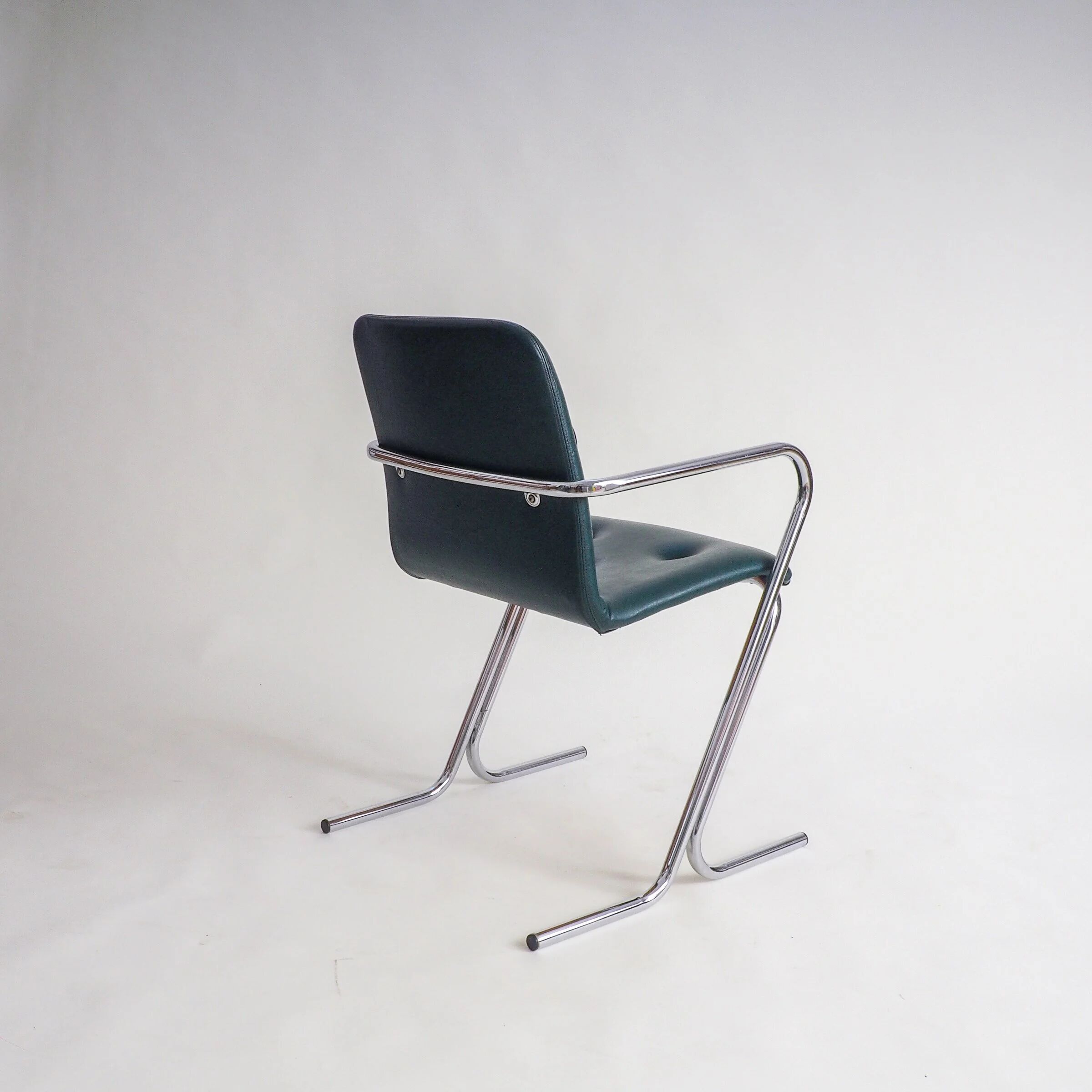 70s tubular arm chair by Tavo