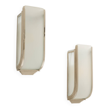 Pair of modernist wall sconces in nickel-plated steel and opaline glass, 1930.