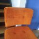 Pair of vintage cantilever chairs in chrome and orange corduroy.