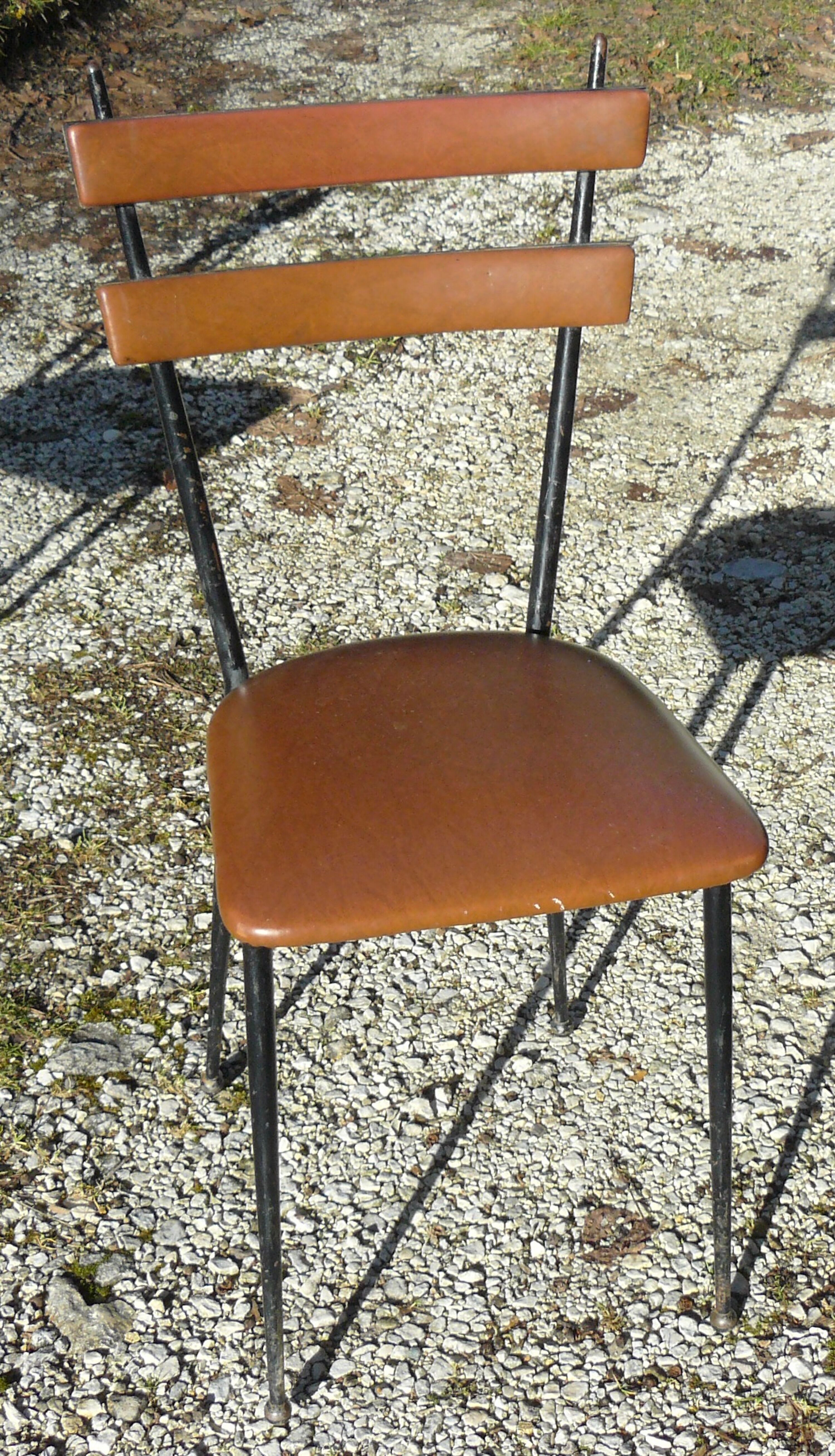 Pair of metal and imitation leather chairs 1950