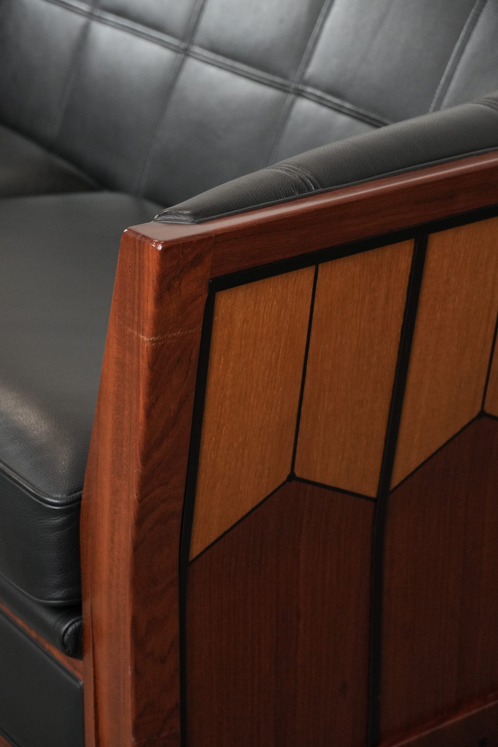 Art Deco  black leather 2.5-seater design sofa with beautiful woodwork