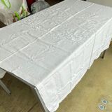 White hand-embroidered square tablecloth at stem stitch