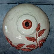 Large vase with relief plant decoration, raw art.