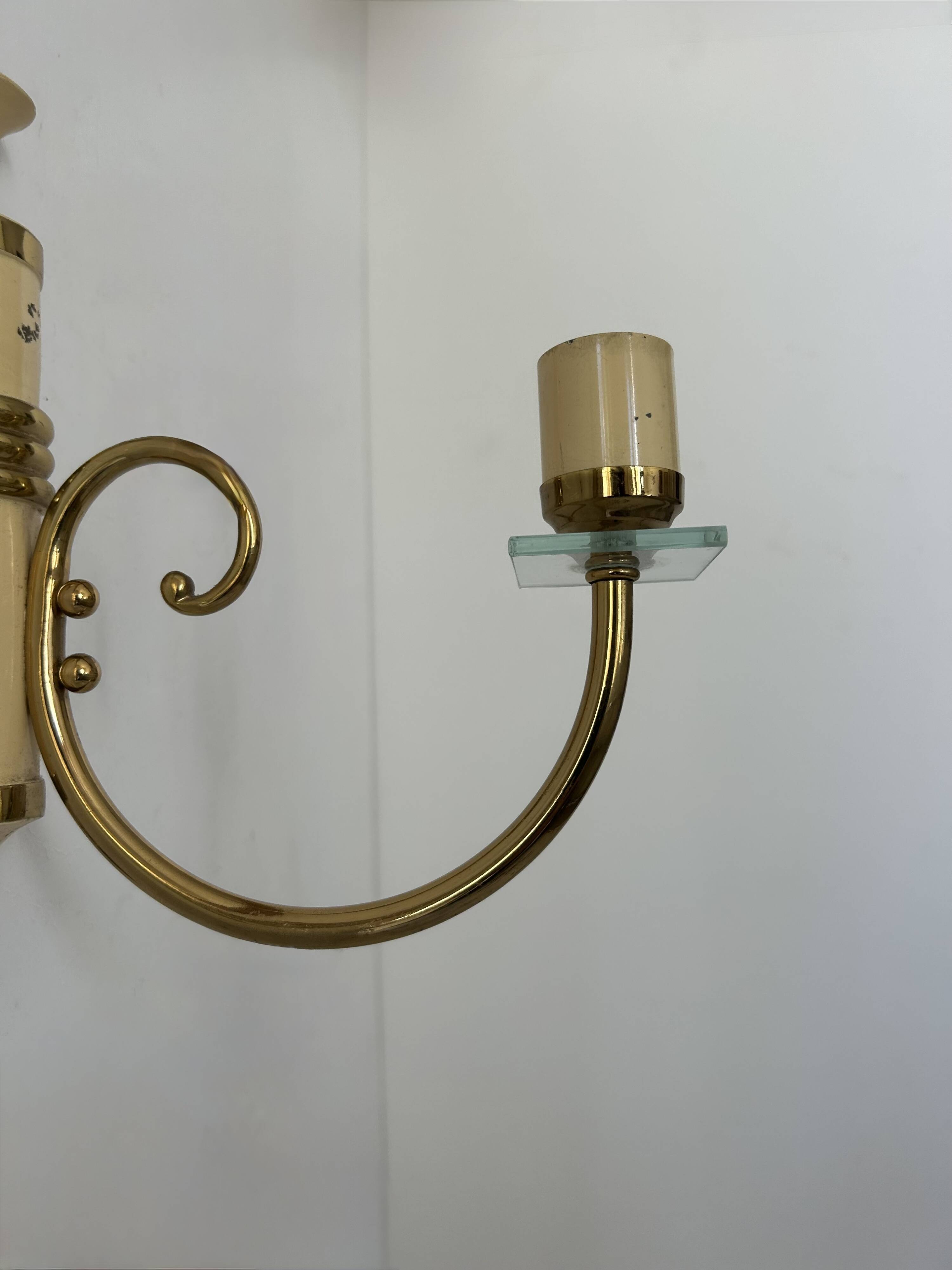 Pair of vintage patinated brass wall lights, France, 1940s