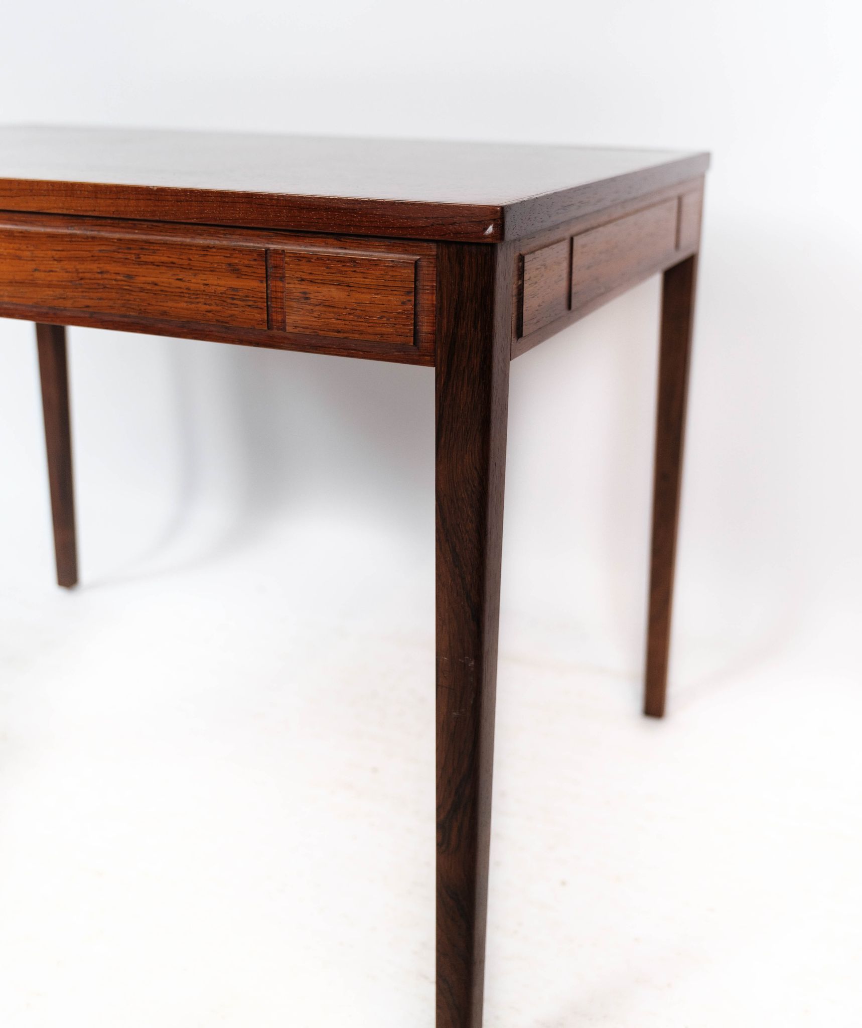 Side table in rosewood of danish design from the 1960s