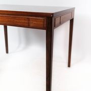 Side table in rosewood of danish design from the 1960s