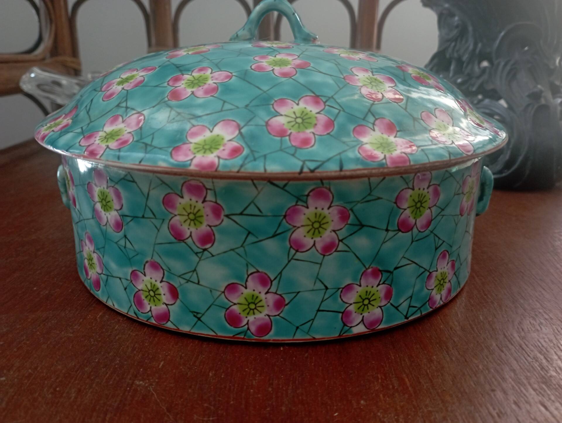 Old glazed ceramic covered pot