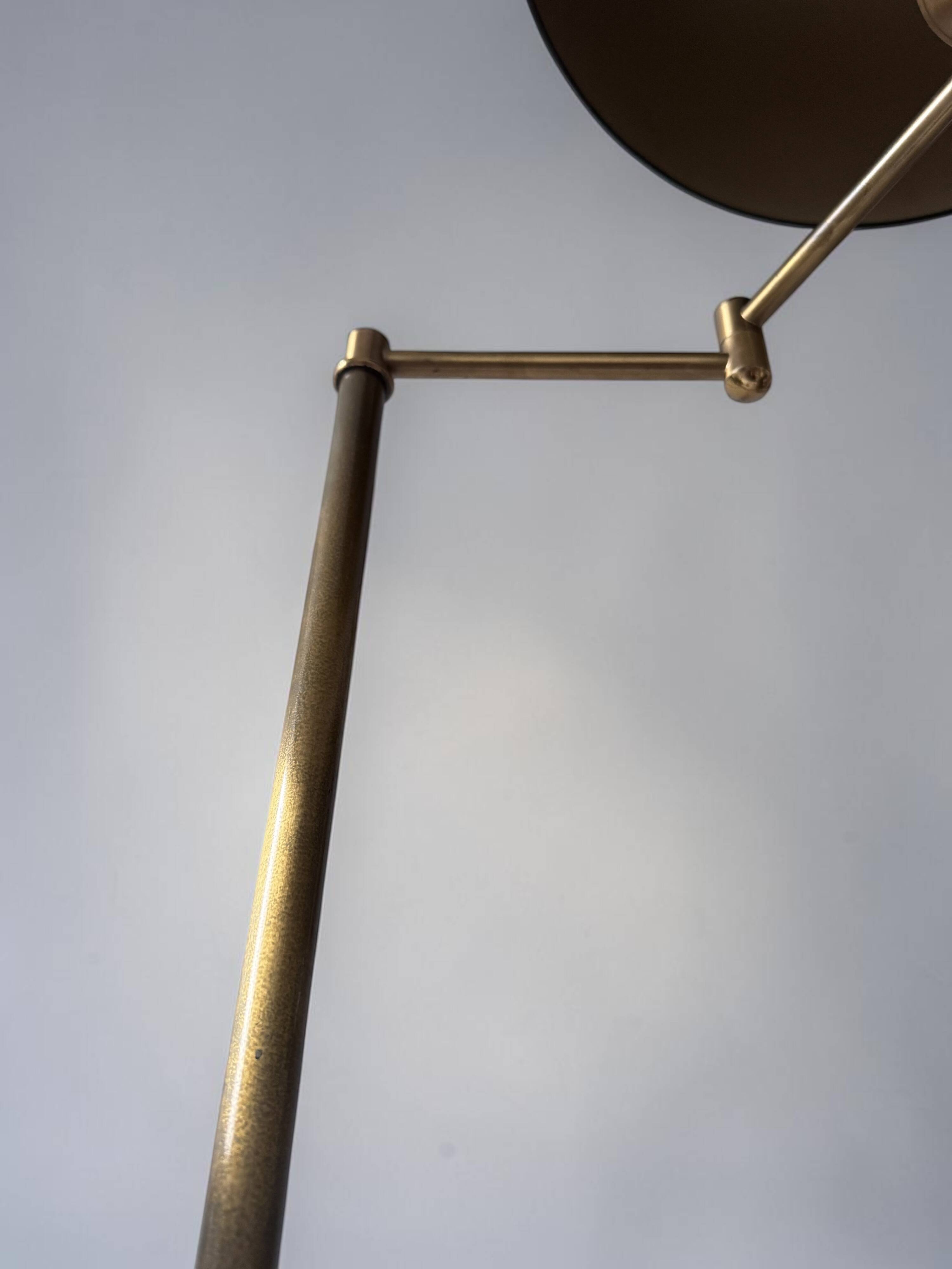 Brass reading floor lamp, adjustable arm, vintage anthracite shade.