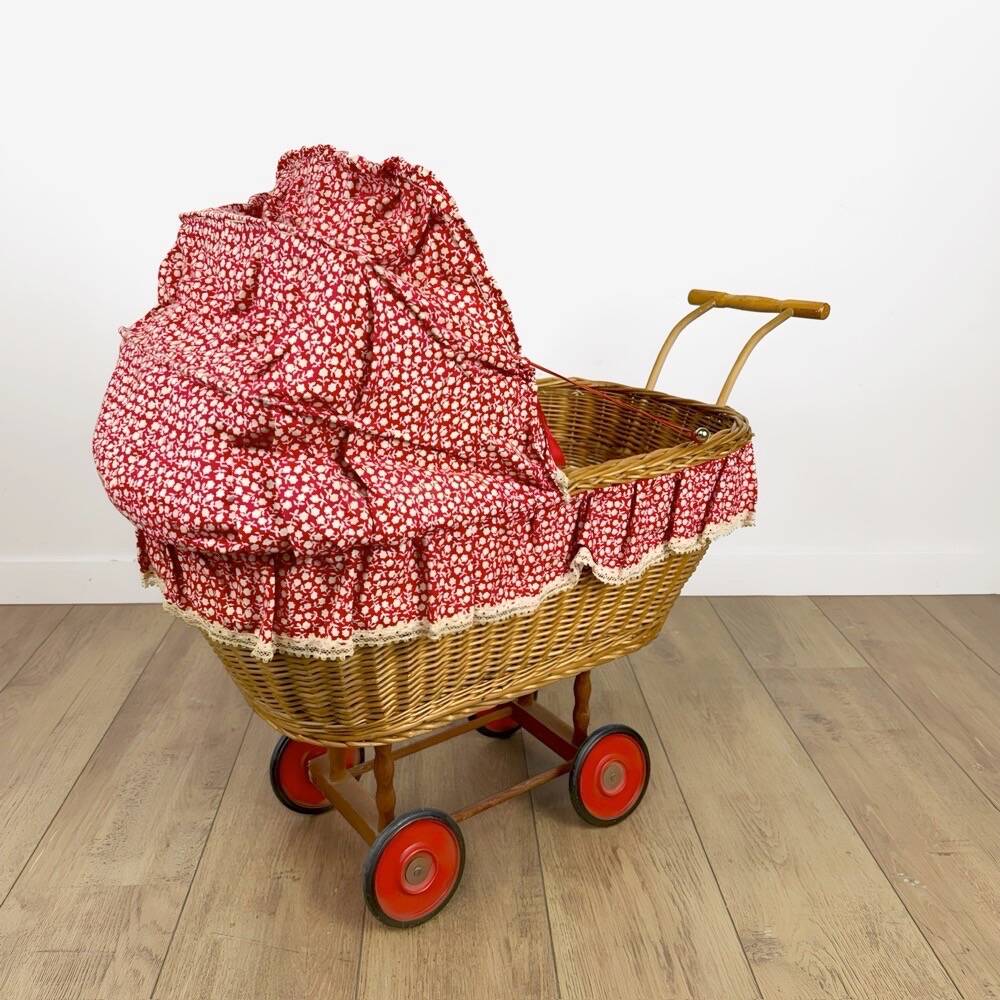 Vintage wicker doll pram cradle
