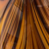 Yellow and black glass vase