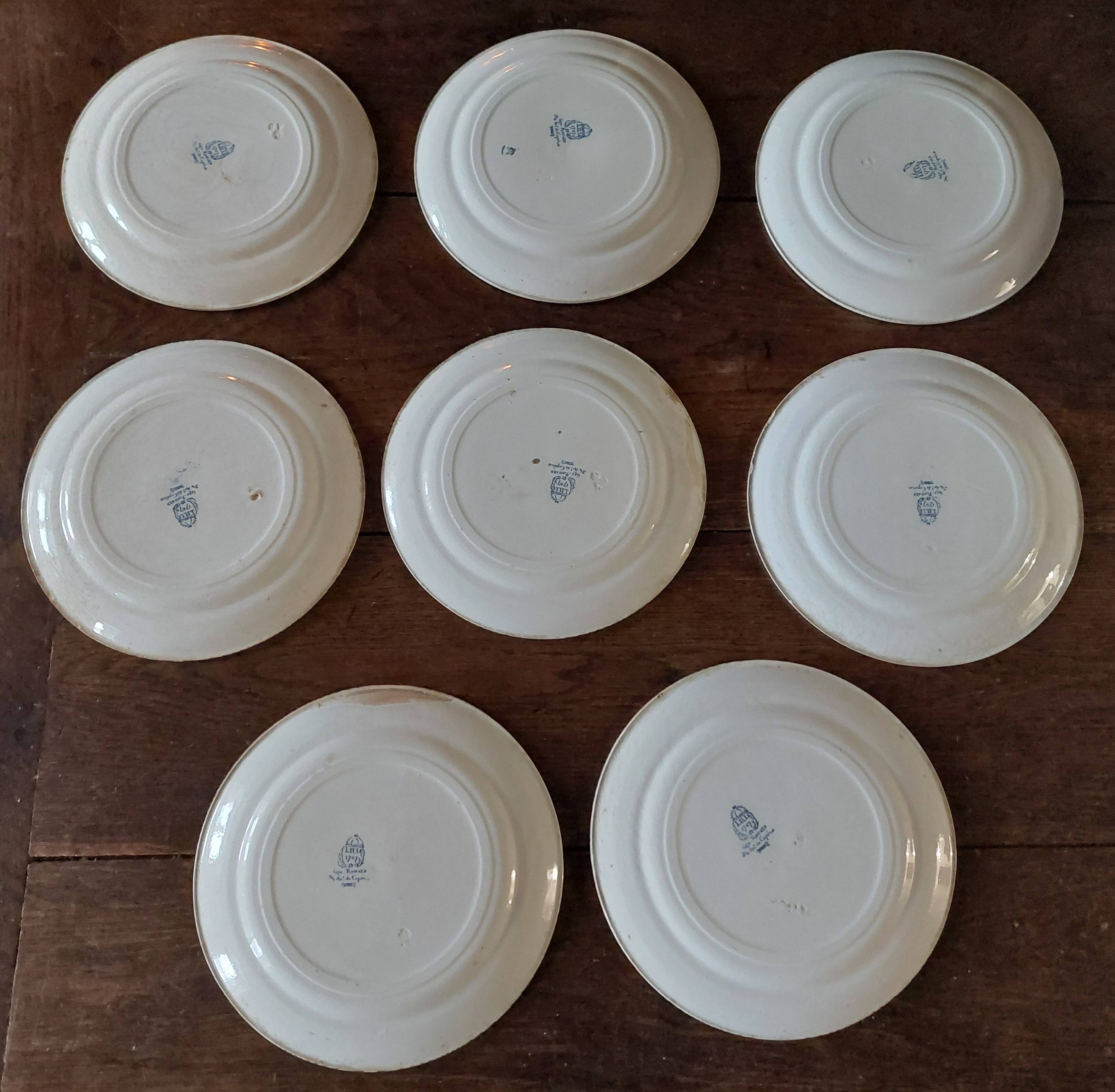 Set of eight flat plates, ironstone, Géon Rouard, Lille decoration, years.