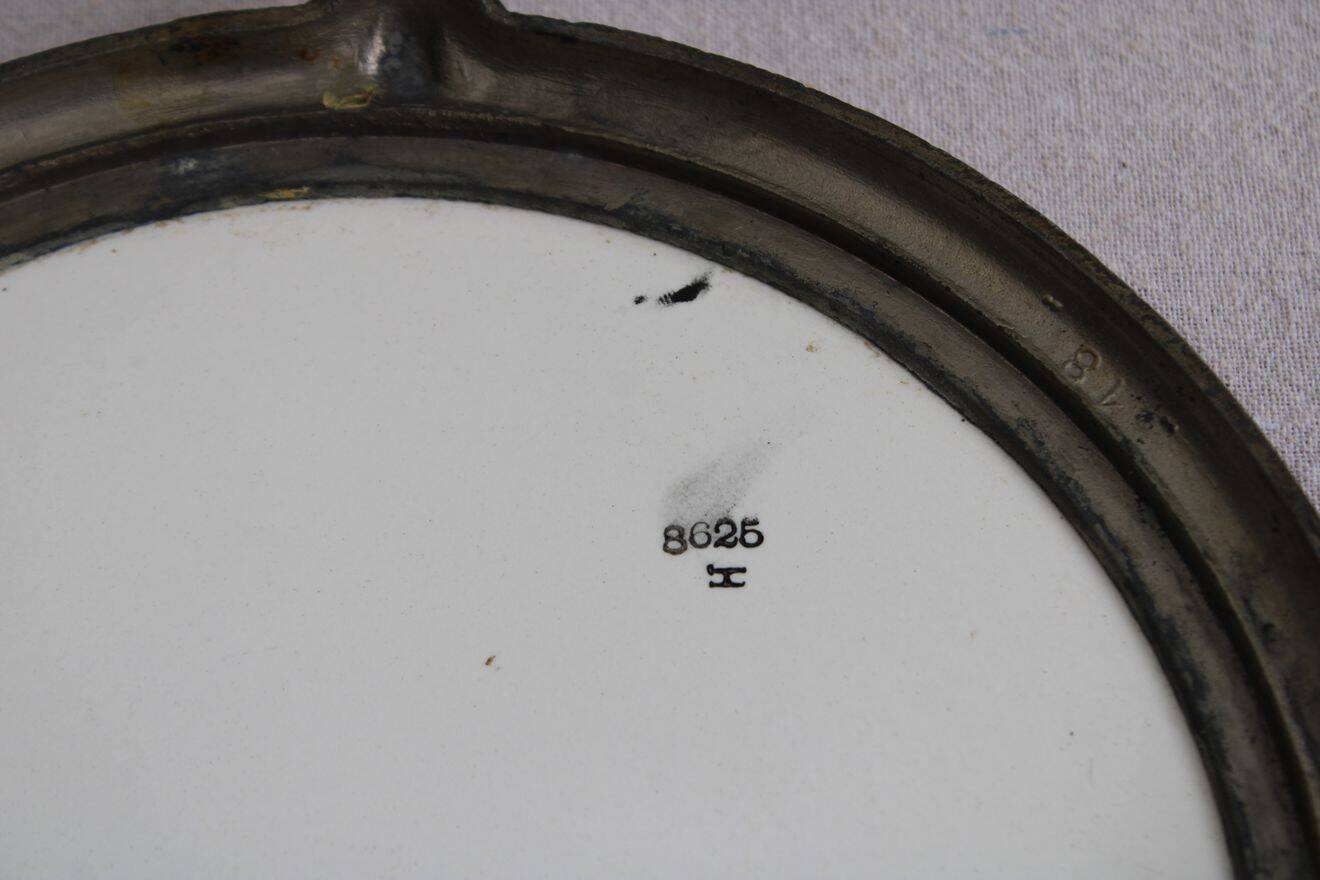 Antique ceramic trivet