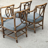 Set of 4 vintage McGuire rattan chairs with cushions.