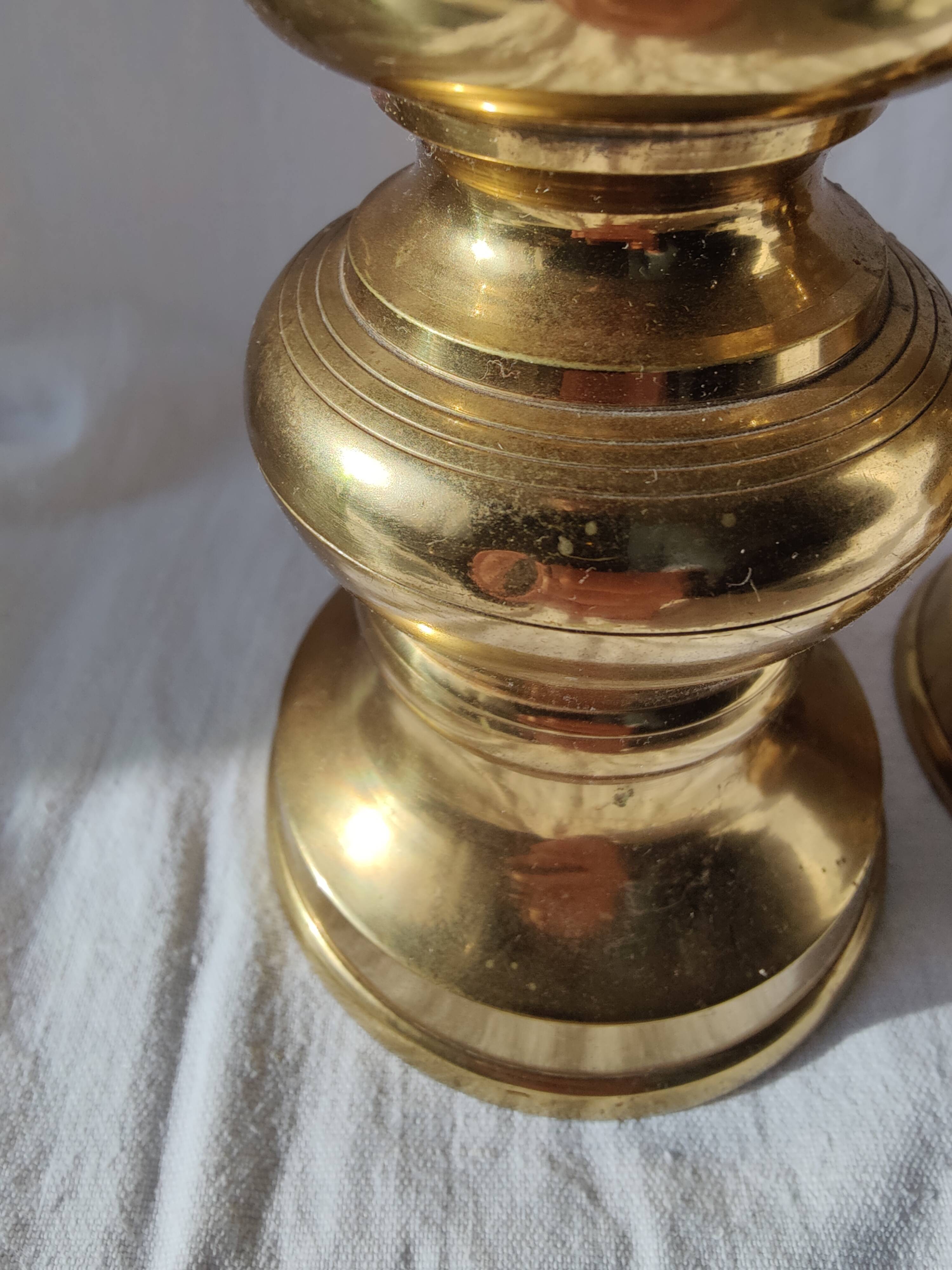 Pair of brass altar candlesticks, mid-20th century