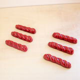 Knife holders in red slurry twist pattern