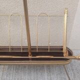 1960s brass folding magazine rack with lacquered wood decoration.