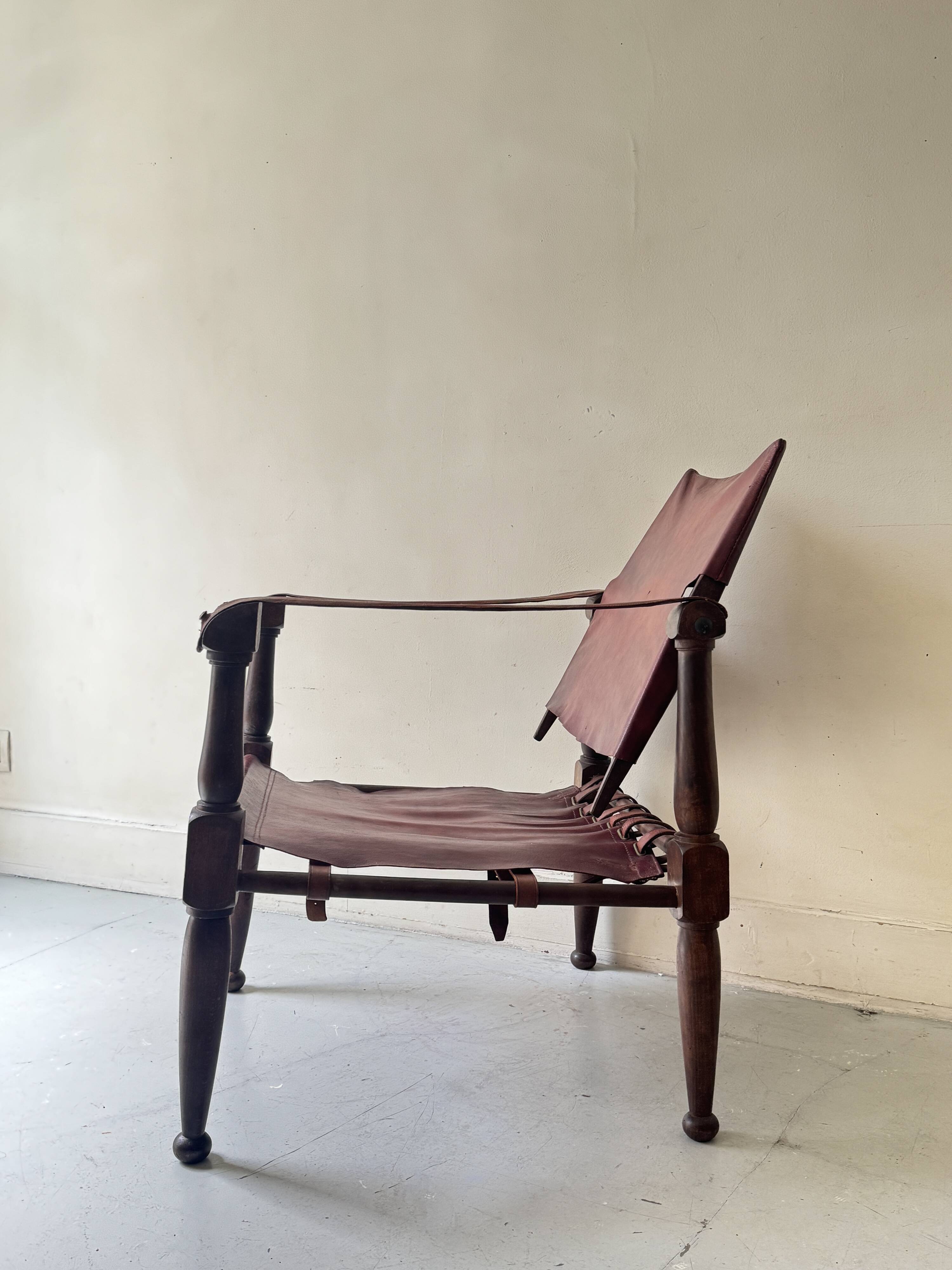 Scandinavian safari armchair in wood & burgundy leather upholstery 20th century