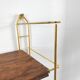 Wood-coloured metal string shelf and gold double studs 1960