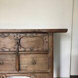 Very old elm wood with carved patterns and ironwork pieces.