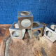 Set of 6 minimalist chrome steel candle holders from the 70s.
