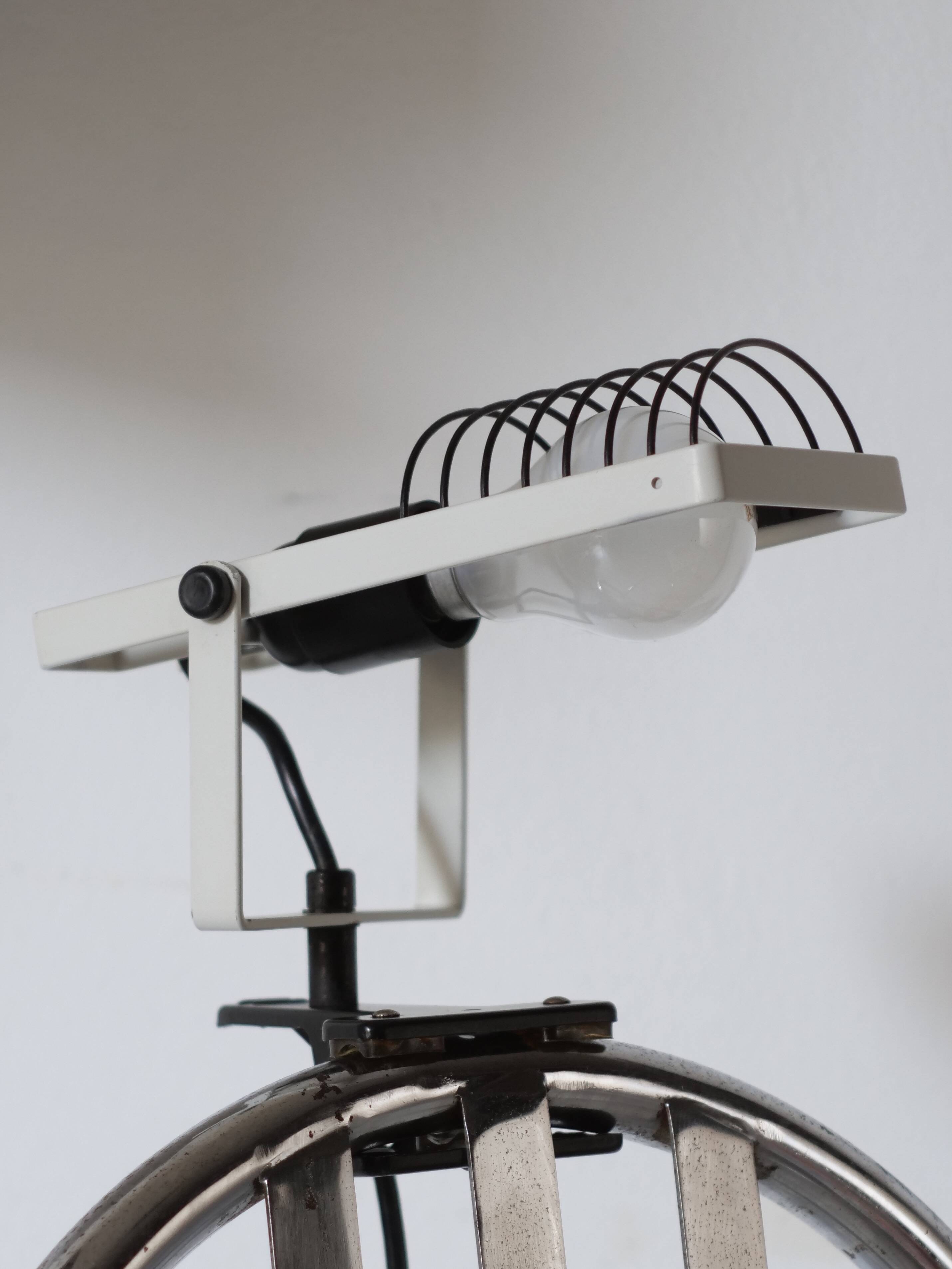 Artemide clamp lamp designed by Ernesto Gismondi model Sintesi