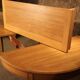 Oval light oak table with extension