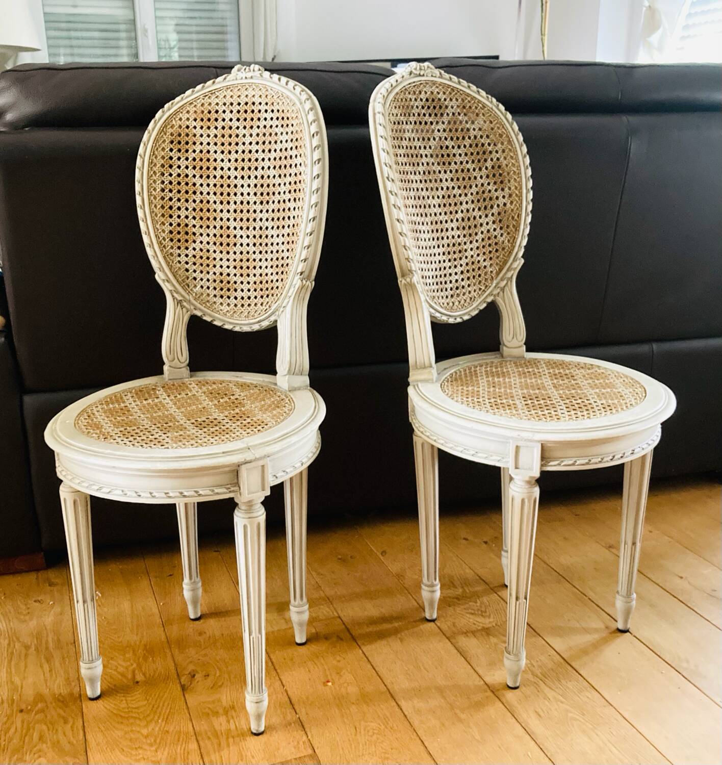 Pair of Louis XVI chairs from the late 19th century with checkerboard caning