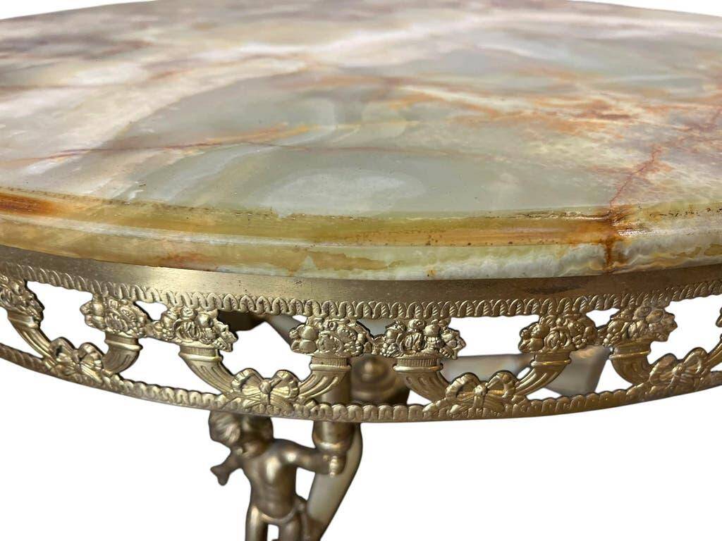 Vintage onyx coffee table with brass frame.