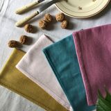 Set of four old damask towels tinted in multiple colors