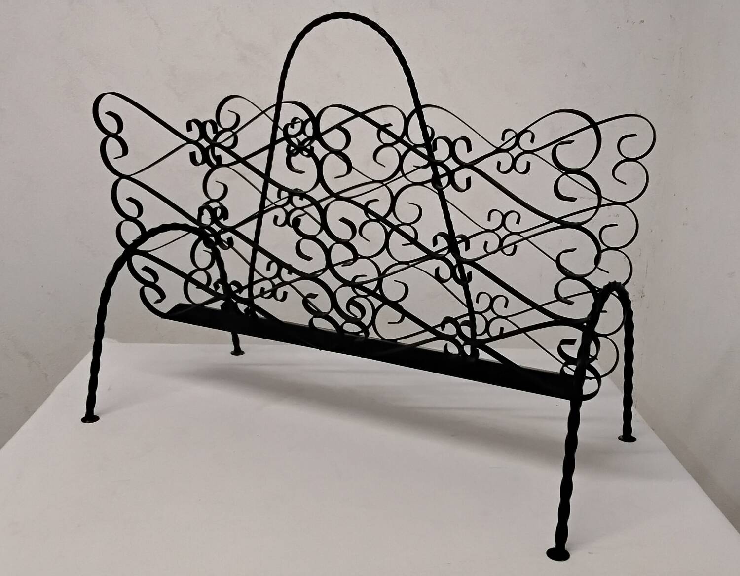 Wrought iron magazine rack signed CHATY Vallauris