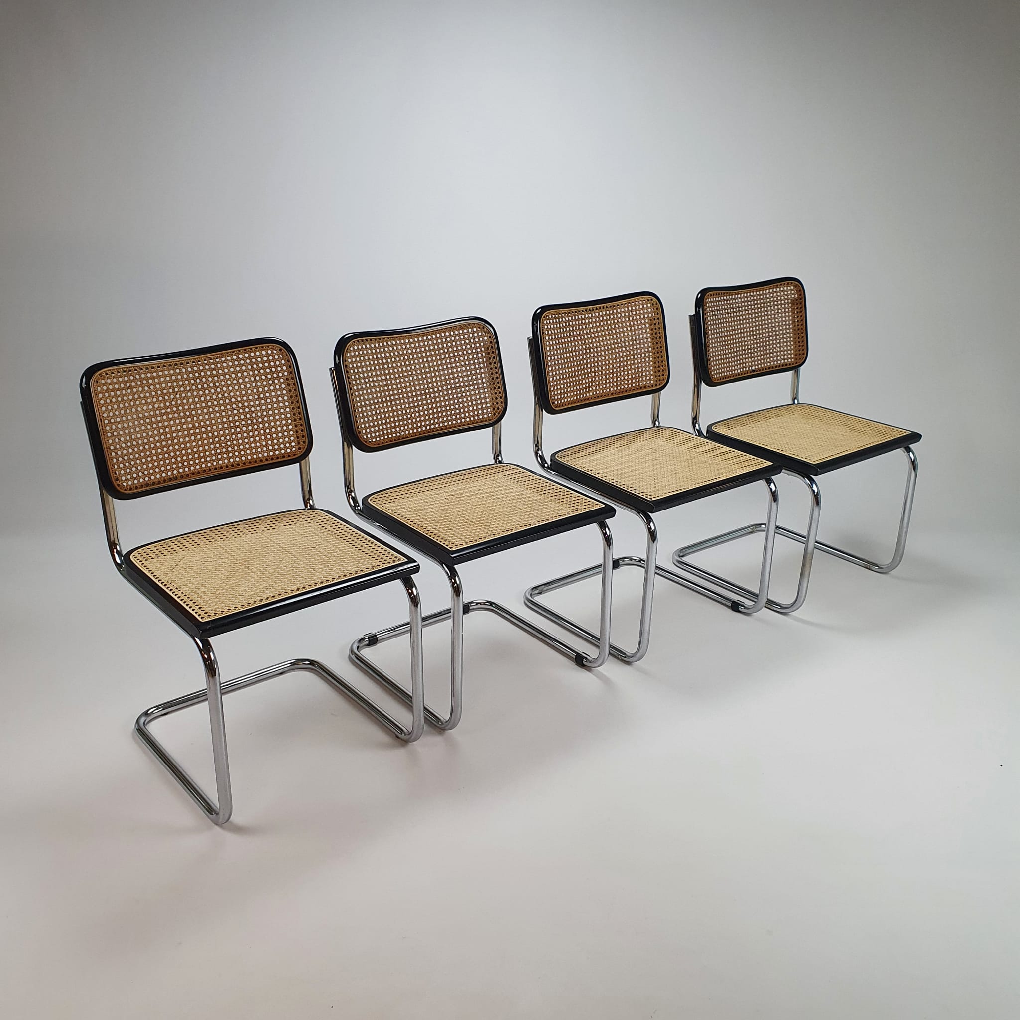Set of 4 tubular frame and cane cantilever dining chairs Breuer Marcel italy, 1970s