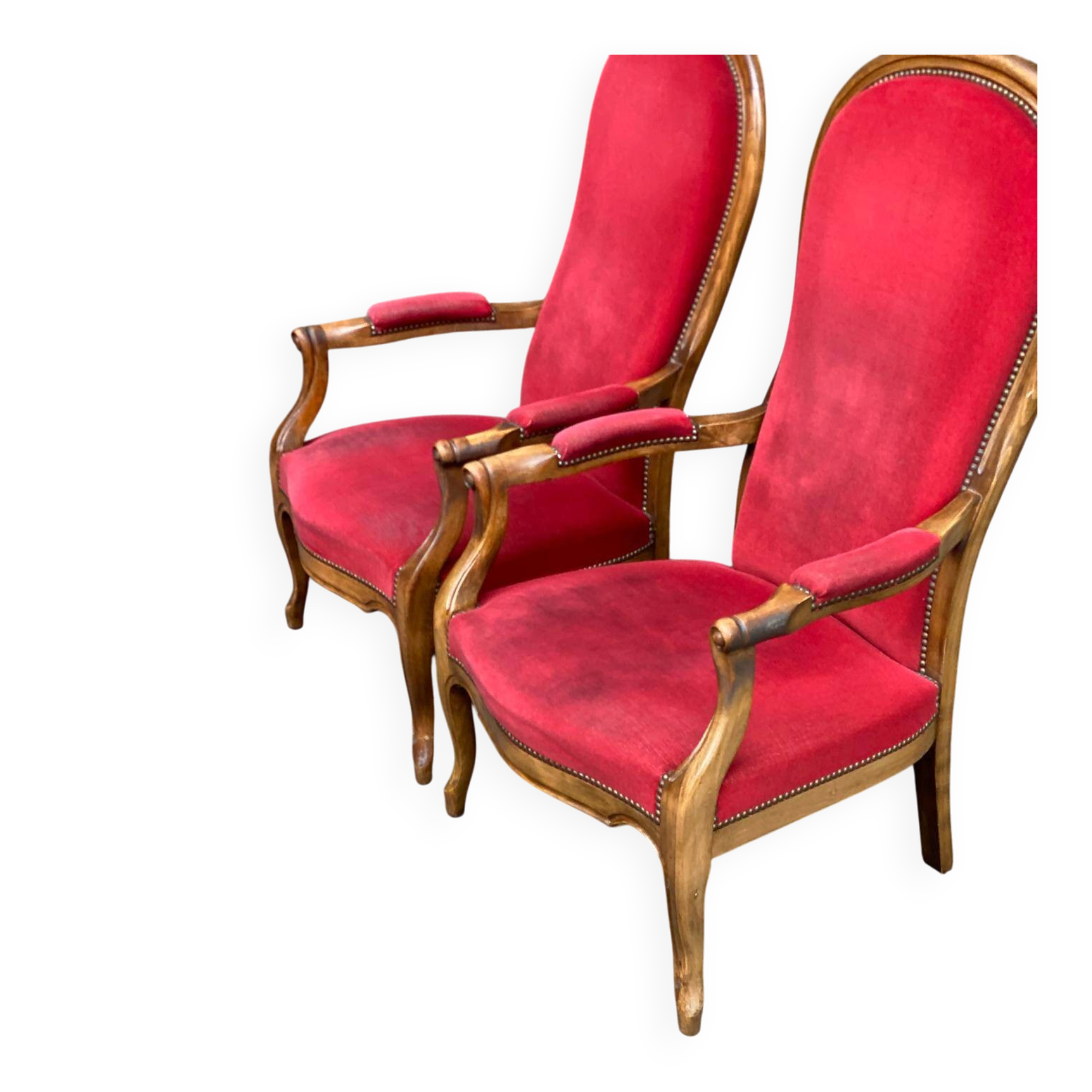 2 Louis Philippe cabriolet armchairs in burgundy velvet wood from the 19th century.