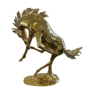 Horse in golden brass