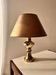 Gilded ceramic table lamp by Gustav Leek, Luxus, 1960s.