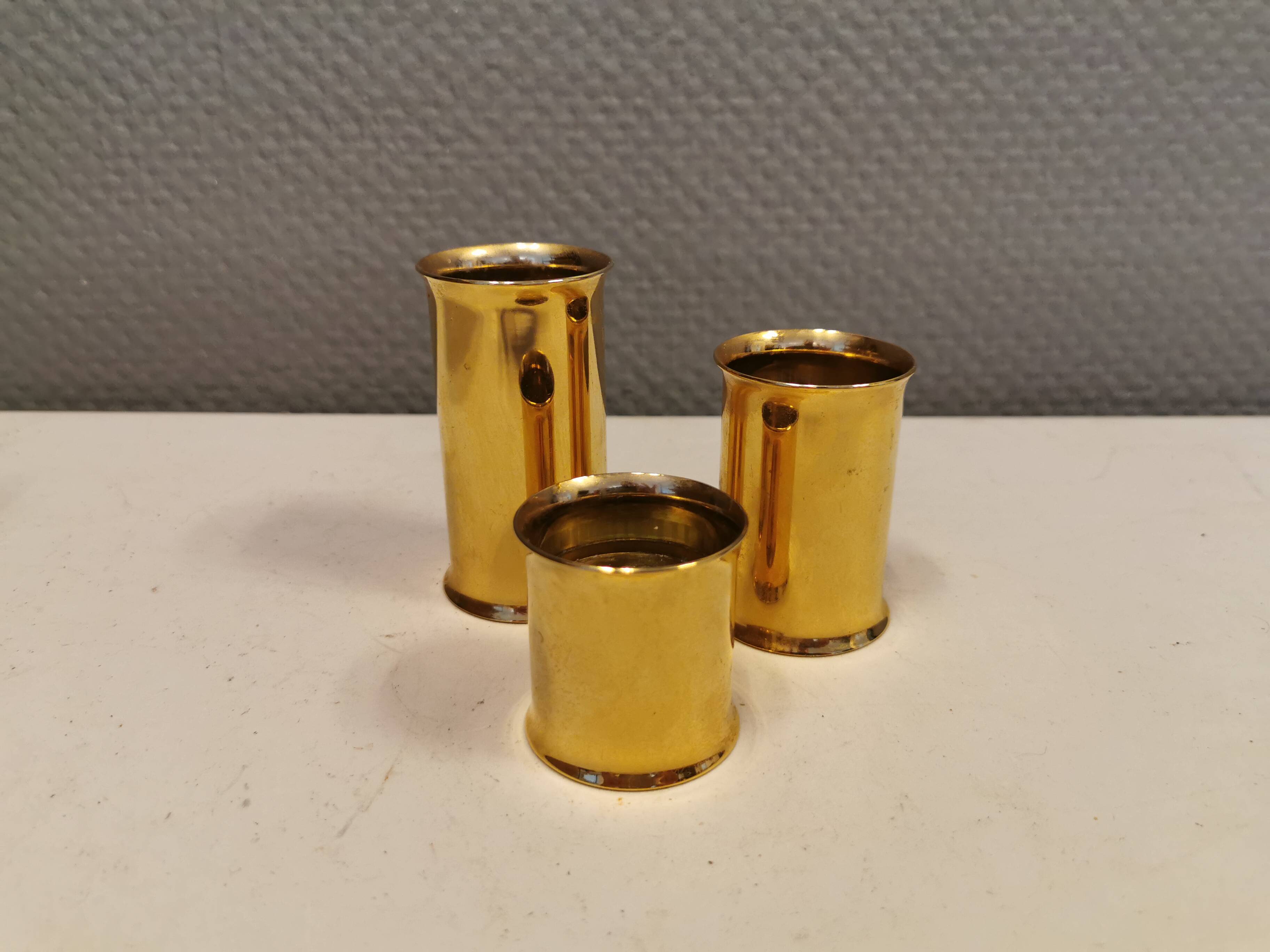 3 beautiful candle holders in 24 carat gold plating.  From Danish Altecco.